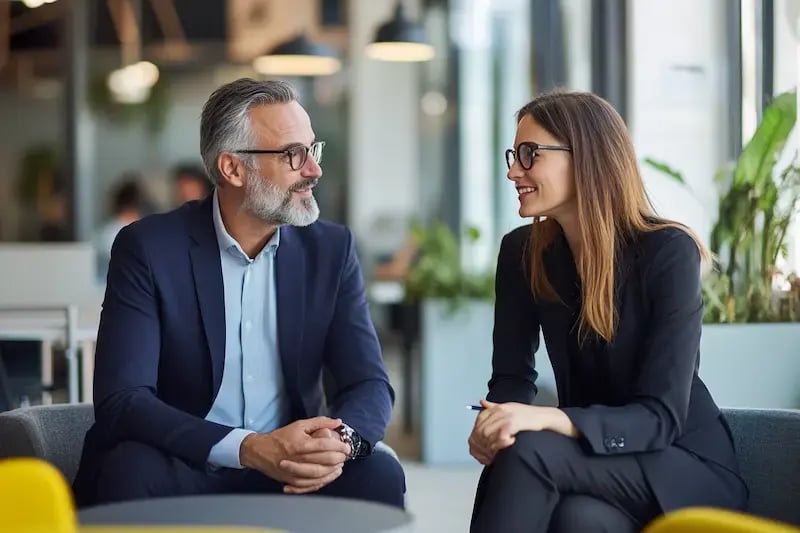 male-and-female-sitting-and-talking